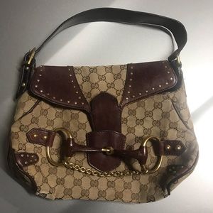 Authentic Gucci flat shoulder hand bag. Added non-brand strap.